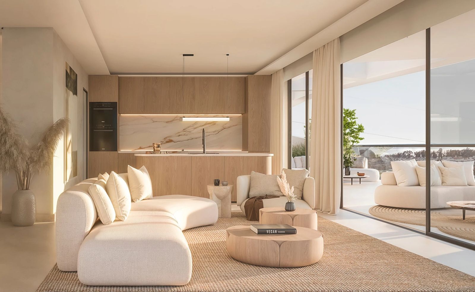 Lichte woonkamer met open keuken in Solaia Residence.